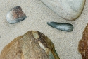 Nice stones sitting on a beach, Fair Isle, Shetlands, Scotland, UK.